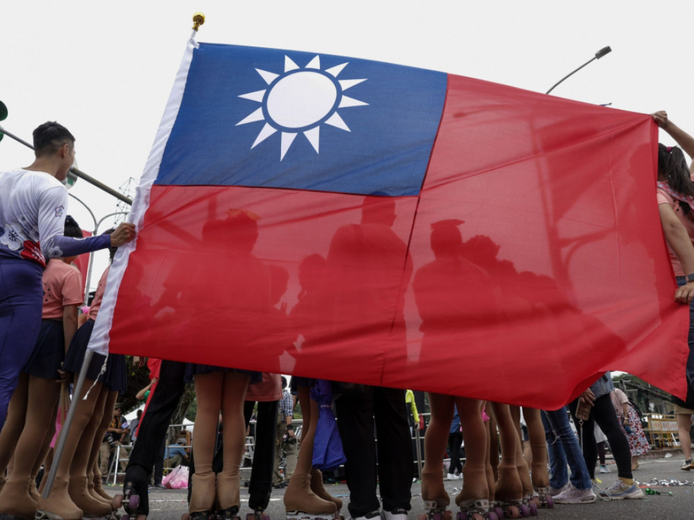 Kitajsko napenjanje mišic Tajvan potiska na tuje trge, tudi slovenskega