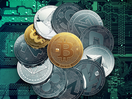 Bitcoin zrušil rekord, dražijo se tudi drugi kovanci